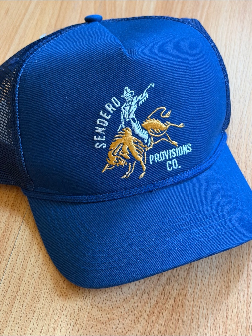 Sendero Provisions Co. Ride or Die Blue Trucker Hat.